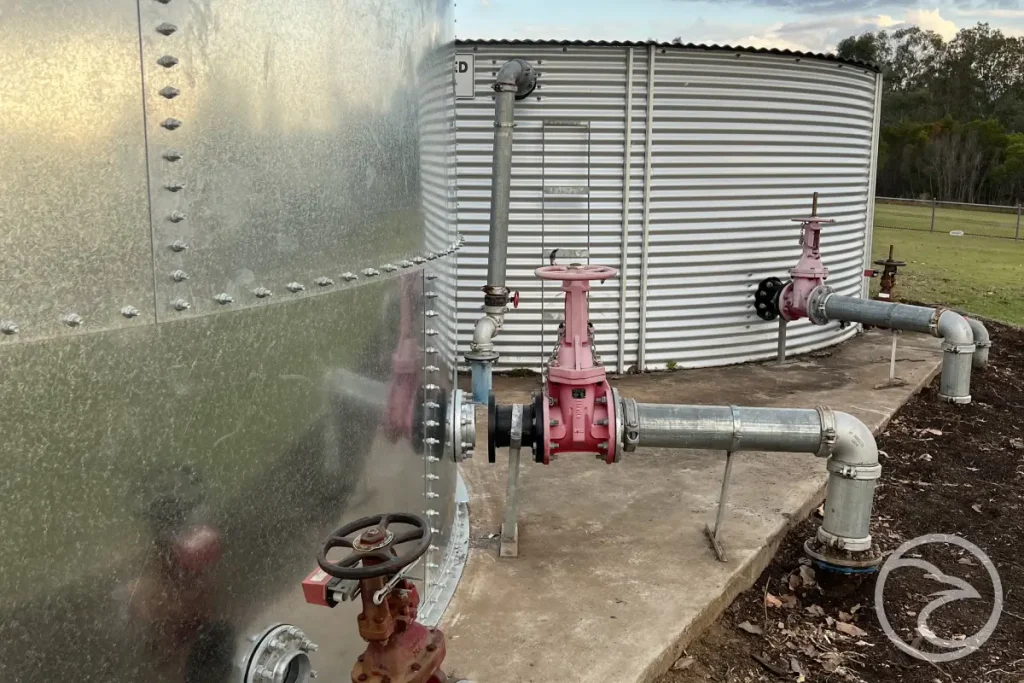 Steel fire water tanks on industrial site