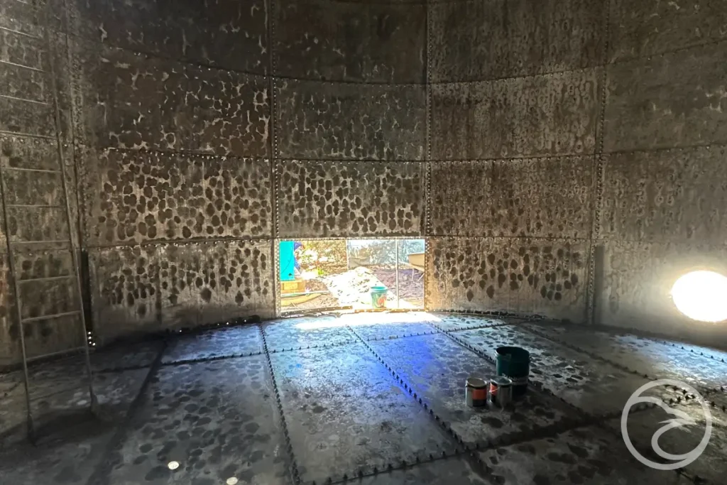 sediment buildup in a fire reservoir before cleaning
